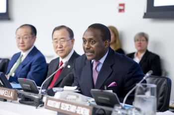 Newly-appointed Special Representative for Sustainable Energy for All, Kandeh Yumkella (right), addresses assembled dignitaries at the United Nations. Secretary-General Ban Ki-moon (centre) and World bank President Jim Yong Kim will provide additional leadership to the energy initiative. UN Photo/Eskinder Debebe