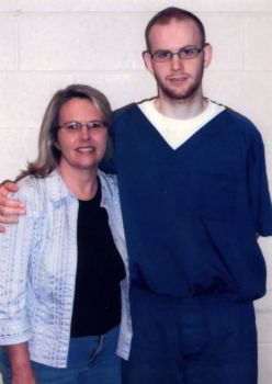 Lois DeMott visits her son Kevin, age 20, at the Woodland Correctional Facility two weeks after his release from a prolonged stay in solitary confinement in 2012. Credit: Human Rights Watch 