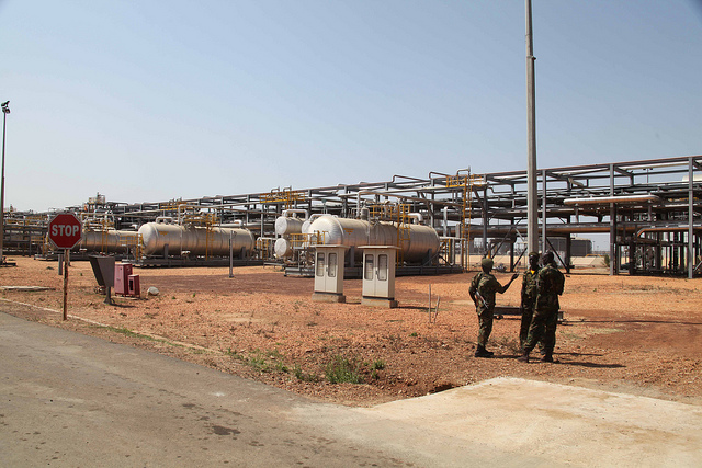 Soldiers patrol an oil field in Paloug, in South Sudan's Upper Nile state. Credit:Jared Ferrie/IPS