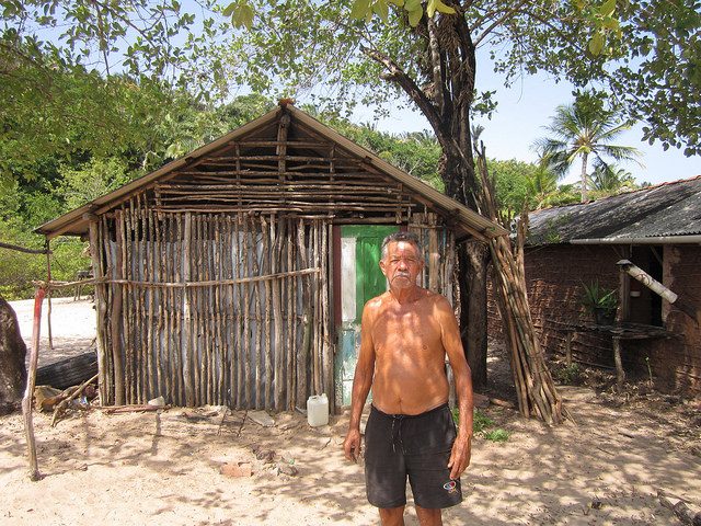 Osmar Santos Coelho, Santico, outside the shed where he keeps his nets and fishing gear, on a narrow beach that escaped takeover by the port terminal built by the Vale mining company in São Luis, in Brazil's Northeast. Credit: Mario Osava/IPS