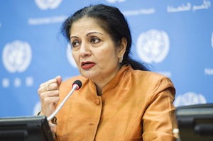 Lakshmi Puri, deputy executive director of UN Women, speaks at a press conference on the International Day to End Violence Against Women. Credit: UN Photo/Mark Garten