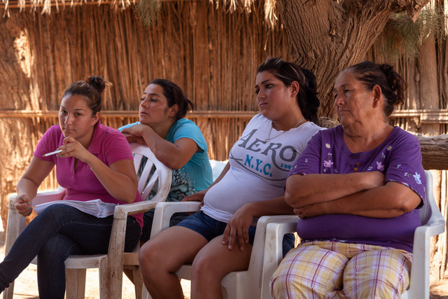 A group of Cocopah women in the Indiviso ejido, in the El Mayor Cocopah Indigenous Community in the Mexican state of Baja California, during an assembly where they discussed how to carry out a consultation on reforming the regulations and laws that limit their fishing in the biosphere reserve. Credit: Courtesy of Prometeo Lucero