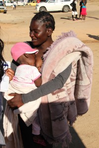 28-year-old Chipo Shumba pictured here holds her only child after she lost six others while giving birth over the past few years, a crisis health experts in Zimbabwe say is on the rise. Credit: Jeffrey Moyo/IPS
