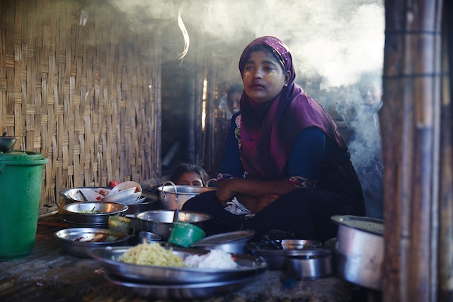 Zadi Begum, a 25-year-old single mother of five, runs a small noodle shop out of the front of her hut. As she fled her village in July 2012 with her mother and children, her husband, 30-year-old Ibrahim, stayed behind to collect some things but was killed by Rakhine Buddhists with a machete. She struggled to raise the roughly 27 dollars needed to buy the basic tools and materials to start her noodle shop. Credit: Courtsey Rob Jarvis