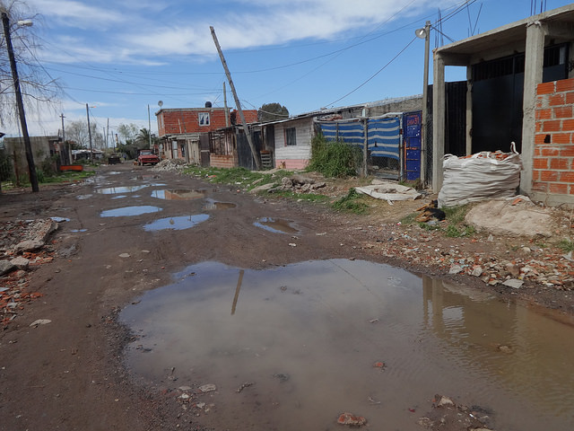 A street in Villa Inflamable, a shantytown in southern Buenos Aires, in the Dock Sud petrochemical complex on the banks of the Matanzas-Riachuelo River. In that neighbourhood, more than 1,500 families are exposed to industrial pollution and toxic waste, which are poisoning their children. Credit: Fabiana Frayssinet/IPS