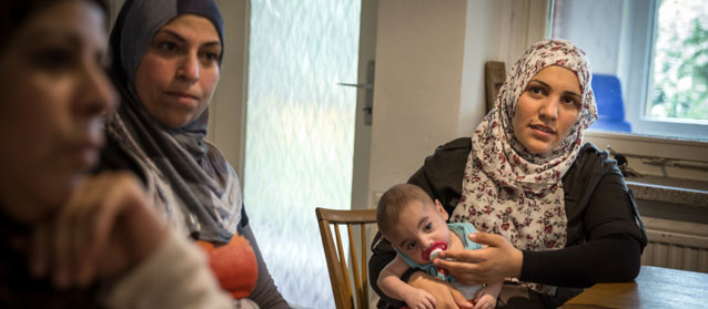 After a three-month odyssey to join her husband, including giving birth to twins in a Serbian hospital, Fatima Khalouf found sanctuary in a German village. Fatima Khalouf (right). Credit: UNHCR/Gordon Welters