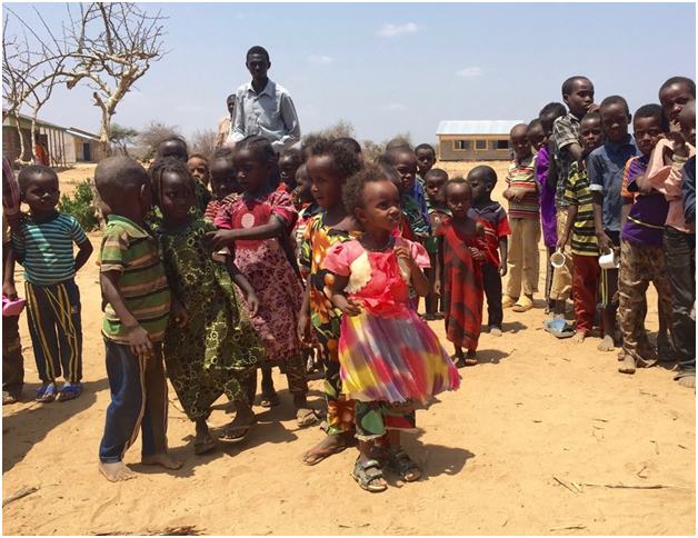 Children queue for a school meal in Marsabit County, Kenya. 3 March 2017. Credit: OCHA/FARAH DAKHLALLAH