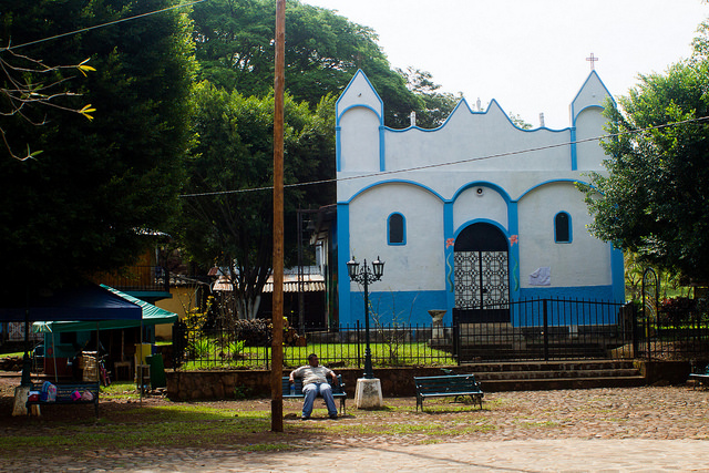 According to the testimonies of the survivors of the El Mozote Massacre in El Salvador, government troops locked women and children in this now rebuilt small church and murdered them in cold blood. Credit: Edgardo Ayala/IPS