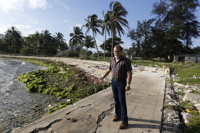  Geographer José Luis Juanes, of the Marine Science Institute, stands along the eroding and polluted shore in Havana, where the new Cuban state body is based. Credit: Jorge Luis Bolaños/IPS
