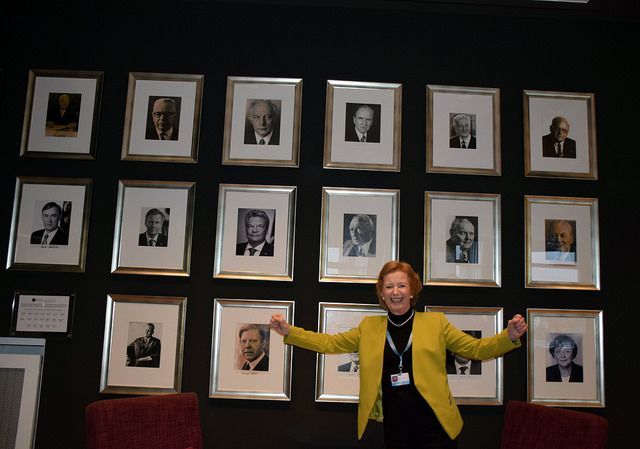 Nobel laureate Mary Robinson poses impromptu before a wall covered in portraits of male leaders at the Bonn climate talks. Credit: Stella Paul/IPS