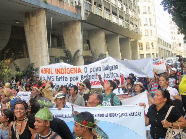 Brazilian Indigenous people during one of their regular protests in Rio de Janeiro demanding the demarcation of their lands and to be taken into account in environmental and climate measures. Credit: Mario Osava / IPS