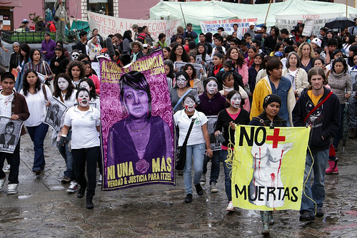 Women demonstrating in Chiapas, southern Mexico, hold posters with two central slogans: &amp;quot;Ni una Menos&amp;quot; (Not one  less), and &amp;quot;Ni una muerta más&amp;quot; (Not one more woman killed). Credit: GlobalCitizen