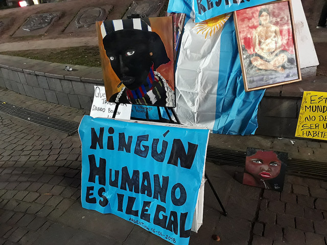 &amp;quot;No human being is illegal,&amp;quot; reads a banner with the Argentine flag in the background in the Jun. 16 demonstration against police brutality towards Senegalese street vendors in front of the Obelisk in Buenos Aires. Almost no Senegalese immigrants participated, apparently for fear of police repression. Credit: Daniel Gutman/IPS