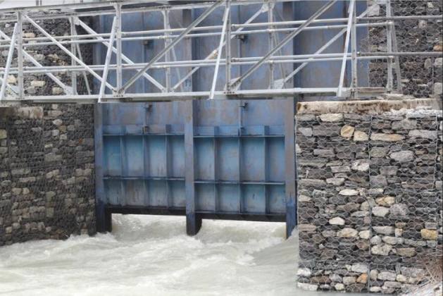 A sluice gate built 20 years ago reduced the level of the water by 3m, but it needs to go down by 20m to reduce the danger of a Glacial Lake Outburst Flood (GLOF). Credit: RASTRARAJ BHANDARI