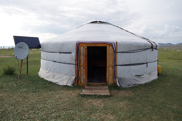 A yurt in Mongolia with a solar panel that provides electricity and also connects the satellite tv. Courtesy: CC By 2.0/Niek van Son