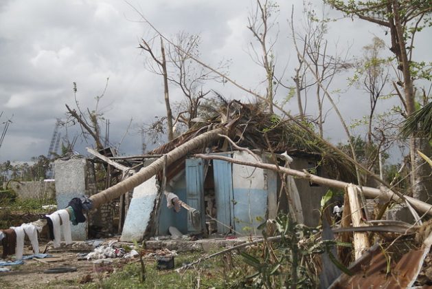 Experts say artificial intelligence (AI) and big data are critical to combat climate change. One project uses AI to visualise the consequences of a changing climate by ‘bringing the future closer.’ It visually projects how houses and streets will look following the impact of climate related events. A file photo of Haiti shows impact on the country after Hurricane Matthew in October 2016. Credit: Kenton X. Chance/IPS