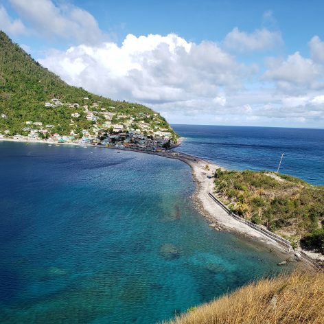 A peninsula separates the Atlantic Ocean and Caribbean Sea in the southwestern village of Scottshead, Dominica. Dominica banned single use plastic in 2020. The UN Decade on Ocean Science is calling for amped up action on conservation and the sustainable use of ocean resources. Credit: Alison Kentish/IPS