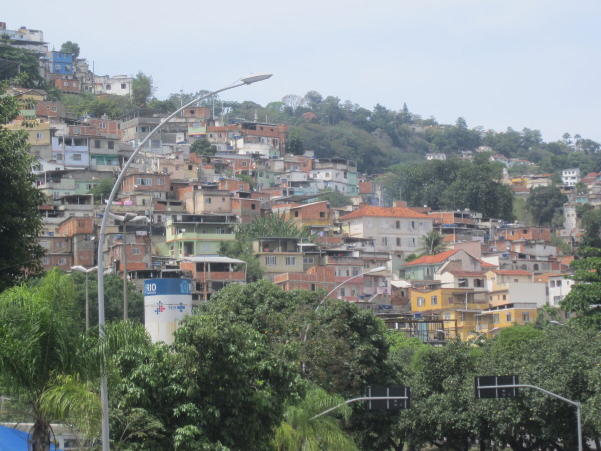 View of a favela on a central hill in Rio de Janeiro, Santa Tereza. The upper part is a middle-class neighborhood of intellectuals and artists. The city’s hillsides are home to many favelas known for their high rates of violent crime. CREDIT: Mario Osava/IPS