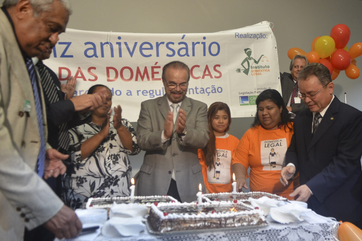 Legislators and trade unionists celebrate the first anniversary of the constitutional amendment establishing the rights of domestic workers in Brazil on Apr. 2, 2014. CREDIT: José Cruz/Agência Brasil