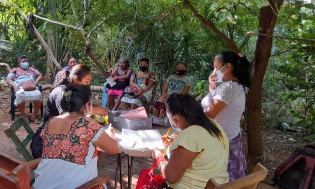 Every other Tuesday, a working group of Mayan women meets to review the organization and progress of their food saving and production project in Uayma, in the state of Yucatán in southeastern Mexico. CREDIT: Courtesy of the Ko'ox Tani Foundation