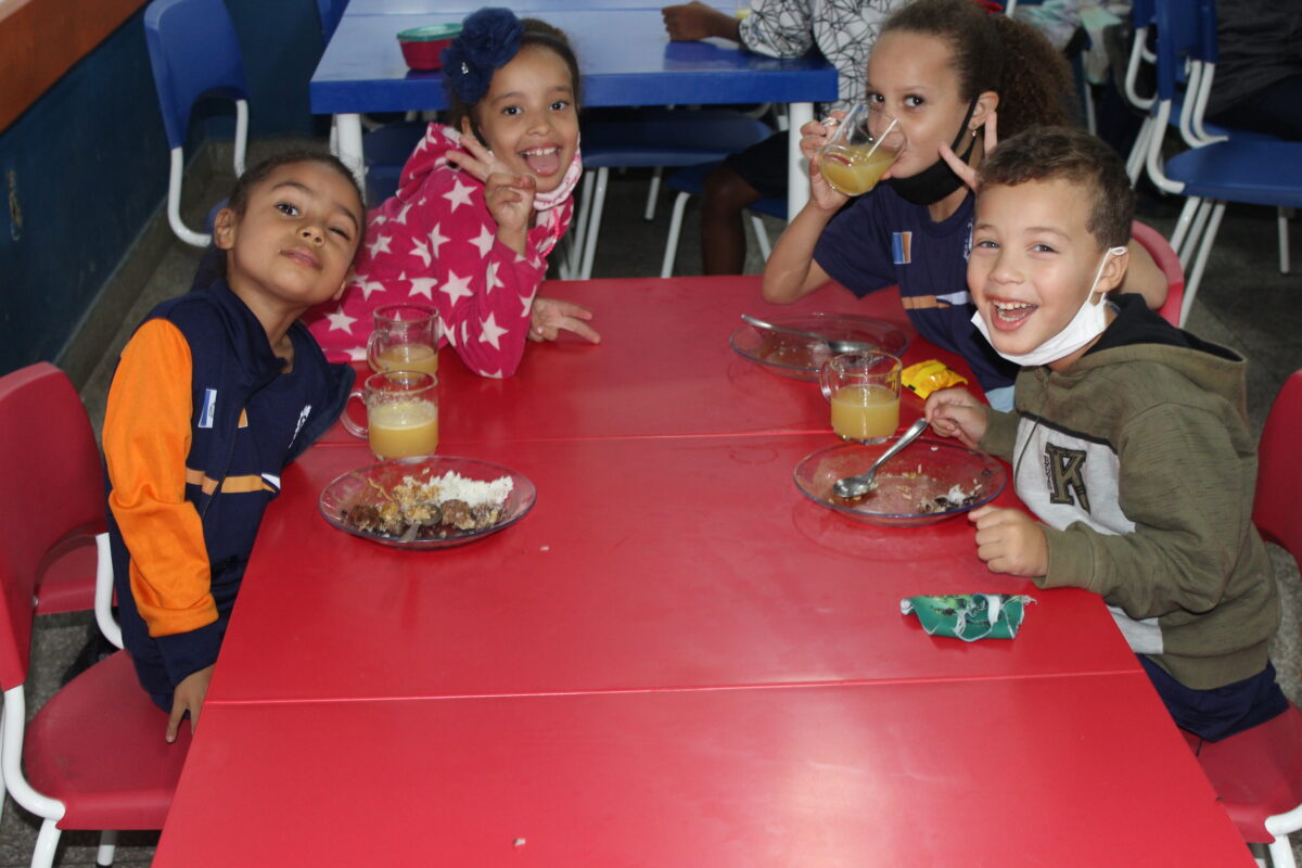 Lunch is a feast for the children at the João Caffaro Municipal School. They are served food that they rarely have in a single meal at home, with meats, assorted vegetables, fruits, natural juices and even cakes for dessert. The meals are a guarantee of good nutrition that was only partially alleviated by food distribution when schools were closed during the peak of the pandemic, in 2020 and much of 2021. CREDIT: Mario Osava/IPS