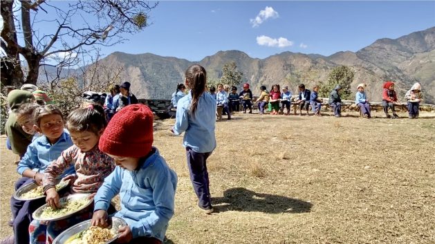 Students have lunch at Shivbhawani Primary School, Deulekh, Bajhang, Nepal.  Credit: Marty Logan