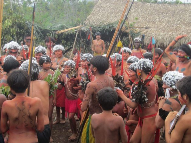 Children and adolescents in a Yanomami community in Parima, on the southern border with Brazil, the area where four indigenous people were shot dead and others injured when they confronted military troops last March. CREDIT: Wataniba