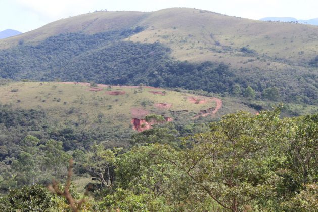 A mountainous landscape in the area of the headwaters of the Velhas River, where "barraginhas", the Portuguese name for holes dug like lunar craters in the hills and slopes, prevent erosion by swallowing a large amount of soil that sediments the upper reaches of the river, in the southeastern Brazilian state of Minas Gerais. CREDIT: Mario Osava/IPS