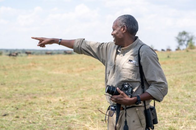 Kaddu Sebunya, CEO of the African Wildlife Foundation (AWF), in the Serengeti. His current role entails spearheading the vision of a modern Africa where human development includes thriving wildlife and wildlands as a cultural and economic asset for Africa’s future generations. Credit: AWF