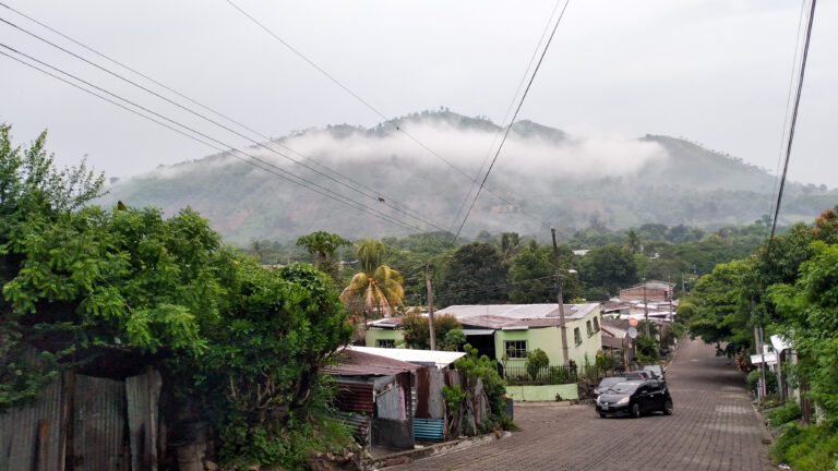 A general view of Parcelación El Ángel, in the Joya Galana canton, in the municipality of Apopa, near San Salvador. The community is fighting to defend the few natural resources that survive in the area, including a stream that originates in the micro-basin of the Chacalapa River. Water in the area is scarce, while Salvadoran authorities endorse an upscale real estate project that will use millions of liters per day. CREDIT: Edgardo Ayala/IPS