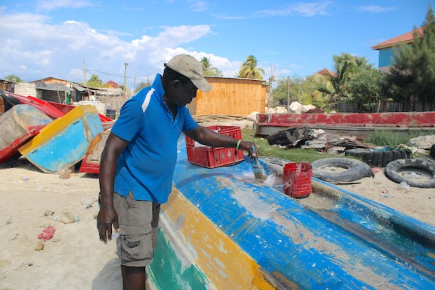 Fifty-year-old fisherman Bradley Bent has been supplementing his income as a boat repairman. Credit: Zadie Neufville/IPS