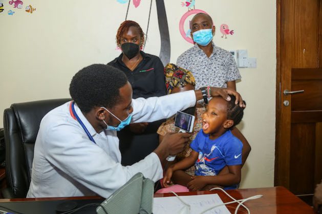 A child has her teeth examined remotely. The Daktari Smart technology means children in rural Kenya are linked to specialist care in big centres. Credit: Daktari Smart