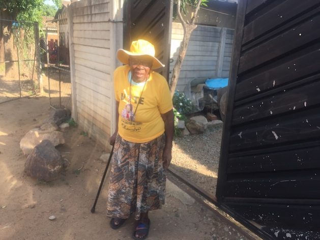 Pictured at her home in Harare, 91-year-old Idah Hanyani, better known as Gogo Chihara, a staunch opposition supporter in Zimbabwe, dons a yellow T-shirt adorned with the portrait of the country’s top opposition leader Nelson Chamisa whom she has vowed to back as she fights for political change in this Southern African nation. Credit: Jeffrey Moyo/ IPS.