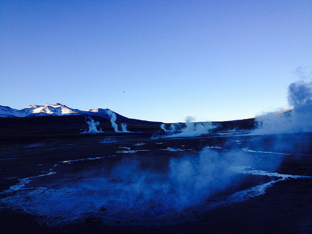 A view of the sunrise amid the steam from the geysers of El Tatio, in the Antofagasta region, where geothermal energy, a non-conventional, clean, infinite source of energy from the earth's internal heat that abounds in northern Chile, has begun to be harnessed. CREDIT: Marianela Jarroud/IPS