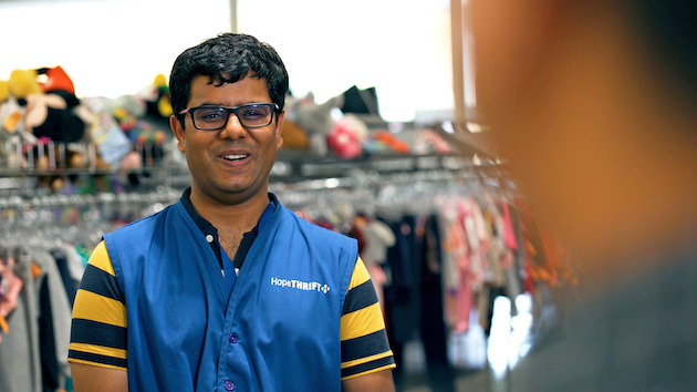 Ramakrishna joined HopeTHRIFT in 2019. Despite his disability in being unable to walk independently, he gained confidence through interacting with strangers while working at the thrift store. Credit: Hope Services