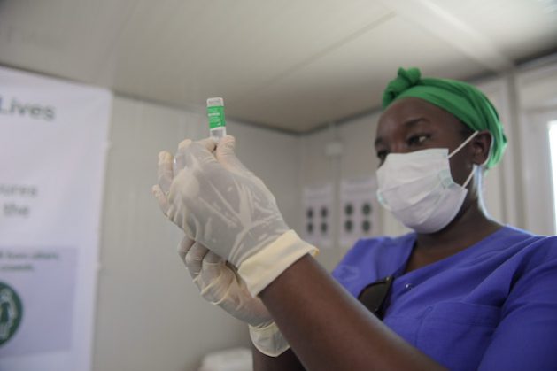 A medical officer preparing to give a COVID-19 vaccine in Somalia in May 2021. Credit: Mokhtar Mohamed/AMISOM