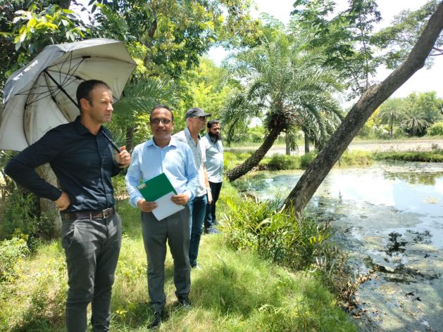 Experts from the Netherlands and Bangladesh visit the Rupsha River in Khulna, southern Bangladesh, the planned site of future fish farms. Credit: IPS/Gemcon