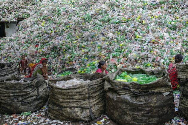 Female workers sort out plastic bottles for recycling in a factory in Dhaka, Bangladesh. New initiatives were launched at the World Circular Economy Forum (WCEF) to reduce plastic pollution. Credit: Abir Abdullah/Climate Visuals Countdown