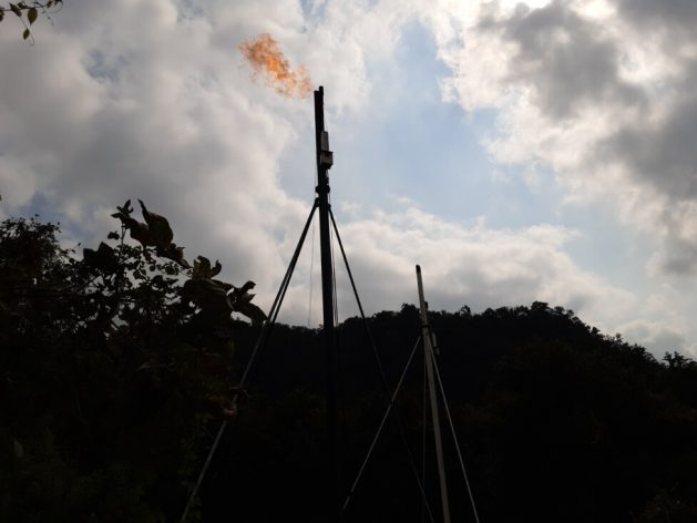 A gas flare at installations of the state-owned Pemex oil company in the town of Reforma Escolín, Papantla municipality in the southeastern Mexican state of Veracruz, on Jan. 11, 2023. More than 100 gas wells operate in the area, several of which release gas without controls and put the local population and their property at risk. CREDIT: Emilio Godoy/IPS