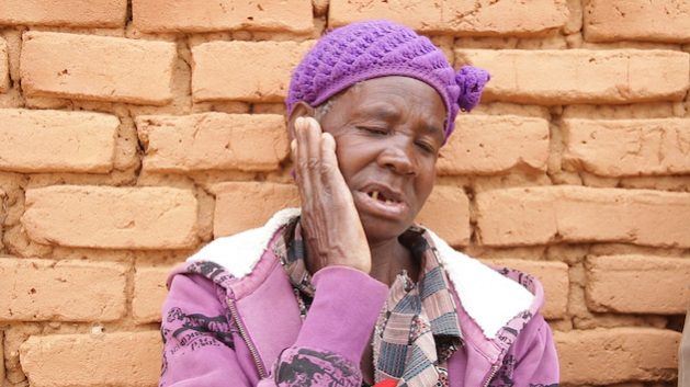 Attacks on the elderly are increasing in Malawi, often under the pretext that witchcraft is at play. Survivor Christian Mphande lived to tell her story, but there is a worrying increase in elder abuse. Credit: Charles Mpaka/IPS