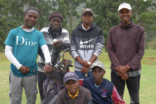 Trust Makanidzani and Vincent Chidambazina and other golf players after their training session was disrupted by a heavy rain in Chimanimani in March. Credit: Farai Shawn Matiashe/IPS 