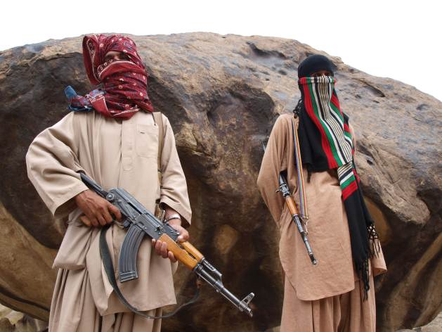 Two Baloch insurgents somewhere in the mountains of Balochistan. Photo: Karlos Zurutuza/ IPS