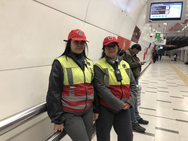 These two women are security guards at the Plaza Egaña subway station, on line 6 in Chile's capital. The state-owned Metro company is increasing the number of women in its services as part of a gender policy that even includes the maintenance of trains. CREDIT: Orlando Milesi / IPS