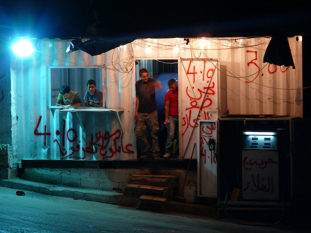 The video, ‘Gas Station’ (2009), created by Jawad Al Malhi, portrays the reality of young Palestinian lives within the confines of Shu’fat camp. Credit: Jawad Al Malhi