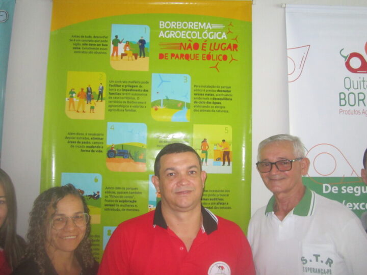 The president of the Union of Rural Workers of the municipality of Esperança, Alexandre Lira (C) and other leaders pose in front of a poster declaring the union's current goals: &amp;quot;Agroecological Borborema is no place for a wind farm,&amp;quot; he says about this area in Brazil's semiarid Northeast region. CREDIT: Mario Osava / IPS