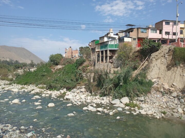 View of the Rimac River as it passes through the municipality of Lurigancho-Chosica, in the Peruvian province of Lima. In this town, many families are still living in housing in areas at high risk, which is exacerbated during the rainy season that begins in December and has intensified due to climate change and the increased recurrence of the El Niño climate phenomenon. CREDIT: Mariela Jara / IPS