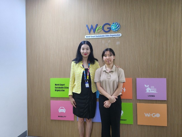 Jung Soon Park, the Secretary General of World Smart Sustainable Cities Organization (WeGo) with the author Hyunsung (Julie) Lee.