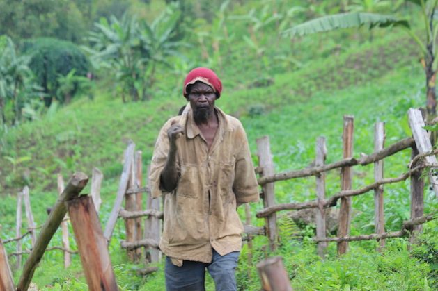 Calisti Wanzama, a farmer, lost most of his relatives to the 2010 landslide in the Bududa district. He fenced off the area where he believes his house once stood. Credit: Wambi Michael/IPS