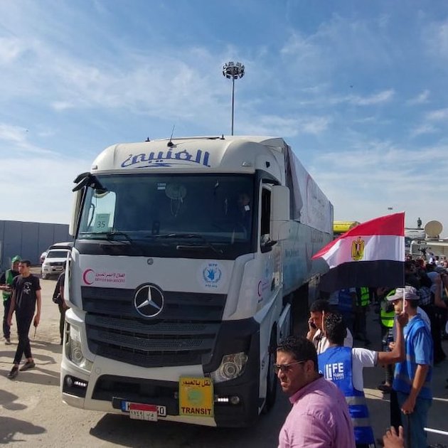 Trucks carrying 60 metric tons of World Food Programme emergency food were among the first humanitarian convoys to cross the Rafah border between Egypt and Gaza. Credit: WFP 