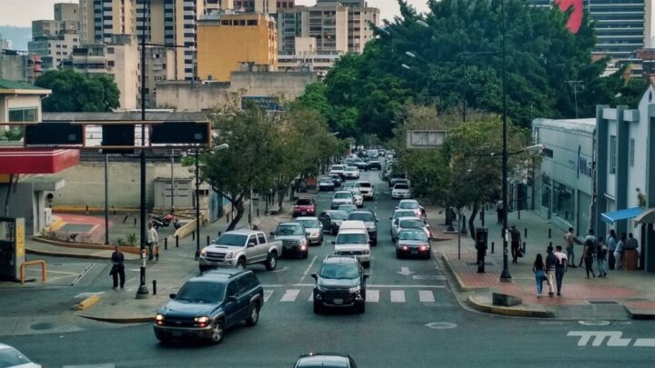 Newer vans and cars drive through middle and upper class neighborhoods, but are part of the "bubble," the small segment of the population less impacted by the deep economic crisis that Venezuela has suffered over the last decade. CREDIT: Motorpasión